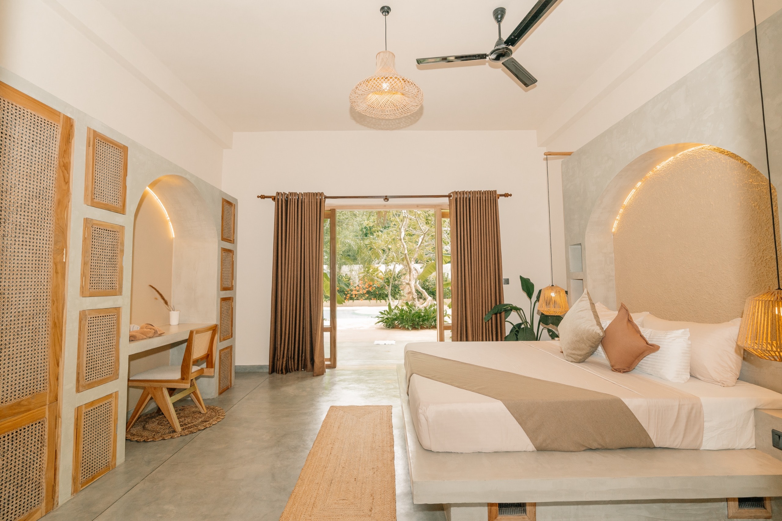 Villa Oura Spirit bedroom with natural wood accents